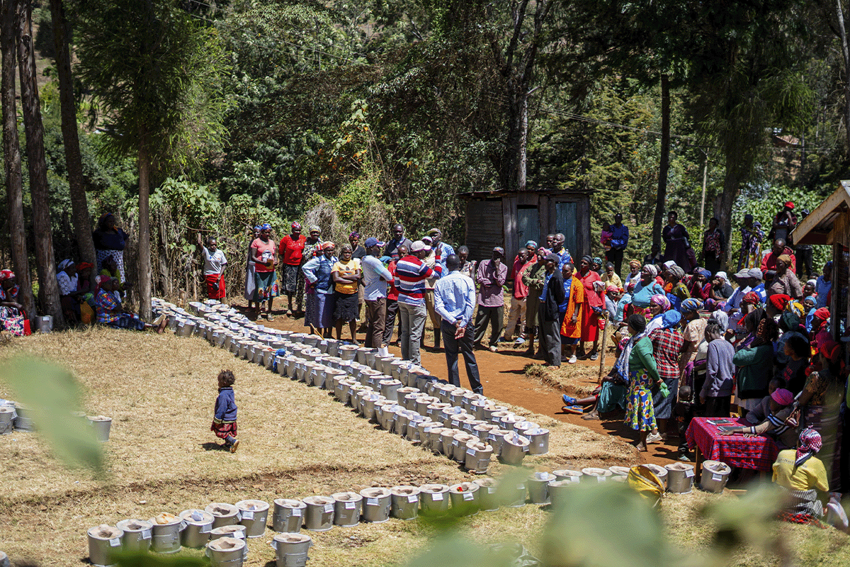 100 Reasons carbon credits are the best thing that ever happened to improve conditions on our planet_DGB team members with local community during cookstoves distribution_visual 4