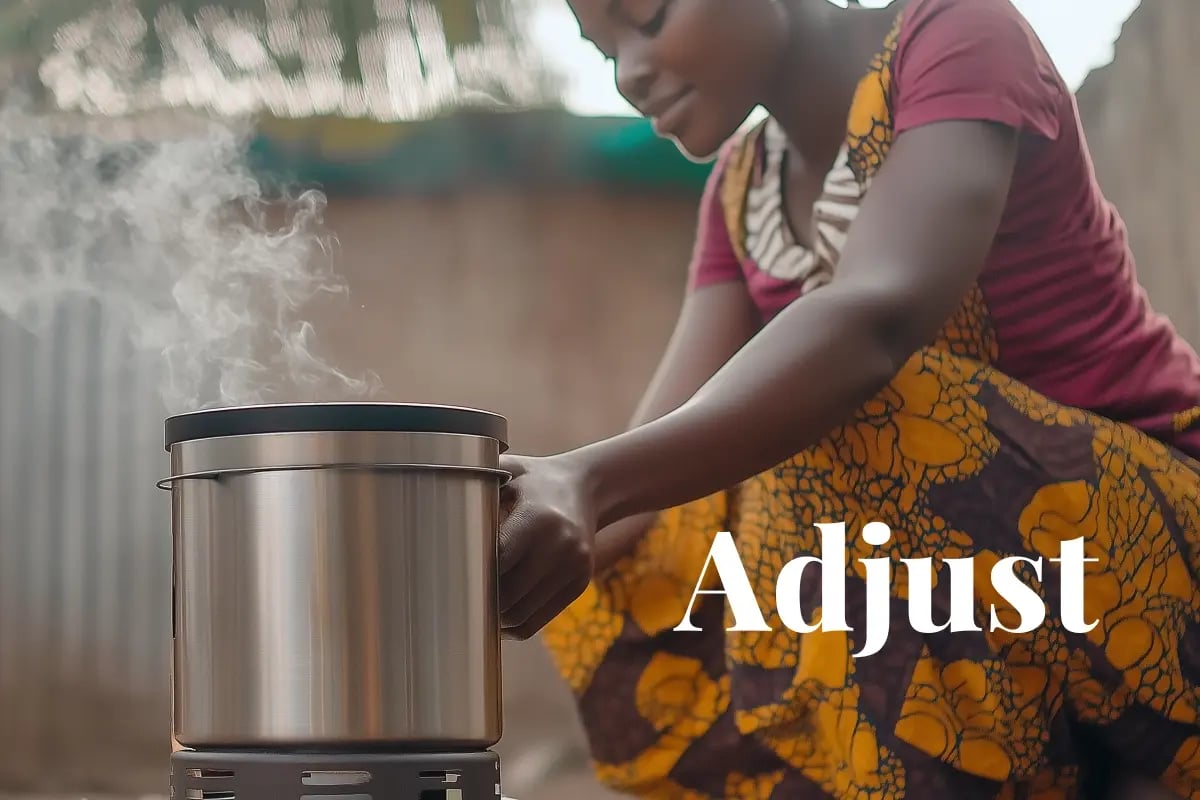 190525_Carbon credit floor prices must rise for high-integrity cookstoves_Close-up of an African woman cooking a meal using an energy-efficient clean cookstove_visual 1