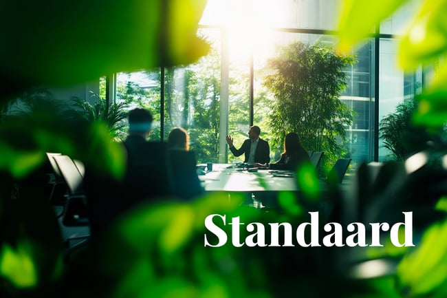Carbon removal enters the spotlight in SBTi’s net-zero draft_An office scene framed by greenery, with employees during a meeting_visual 1_NL