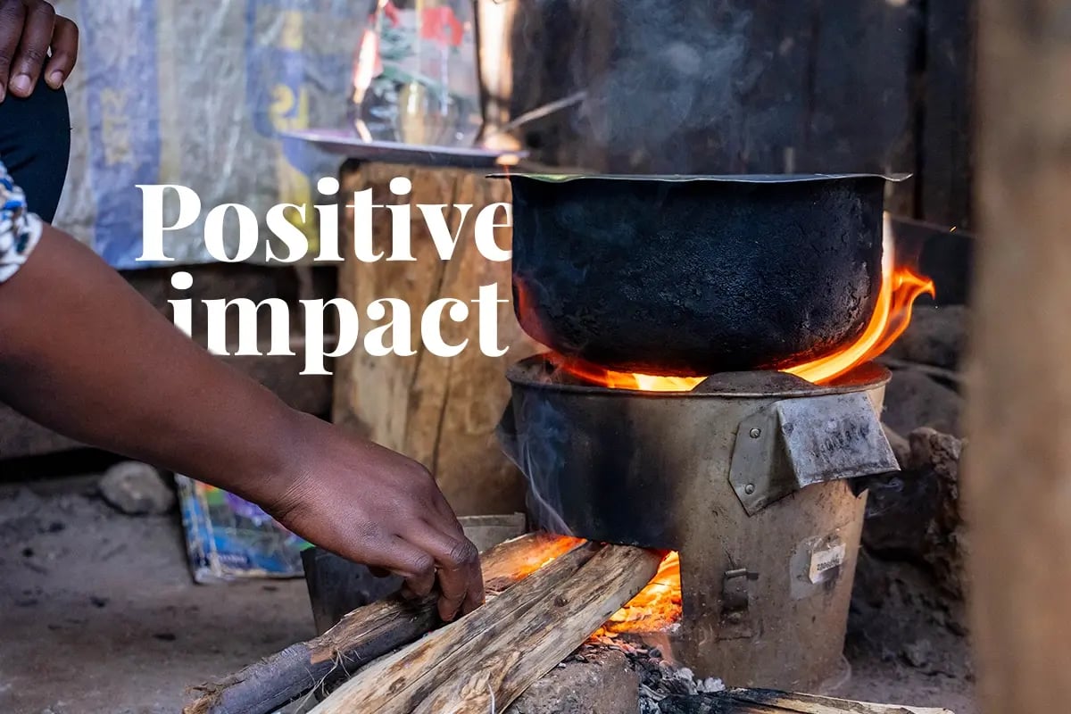 DGBs cookstove projects, How they truly make a difference_A close up of a woman preparing a meal using an Energy efficient cookstove_visual 1