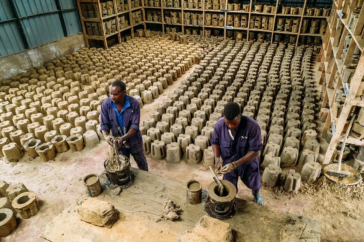 DGBs cookstove projects, How they truly make a difference_Local men working in the cookstove factory_visual 6