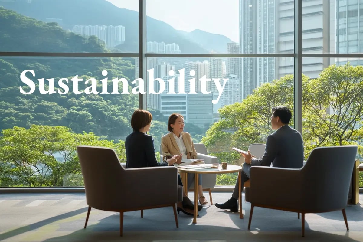 Hong Kong rises as a global magnet for ESG investments__Family office meeting in Hong Kong with city skyline and greenery in the background_visual 1_EN