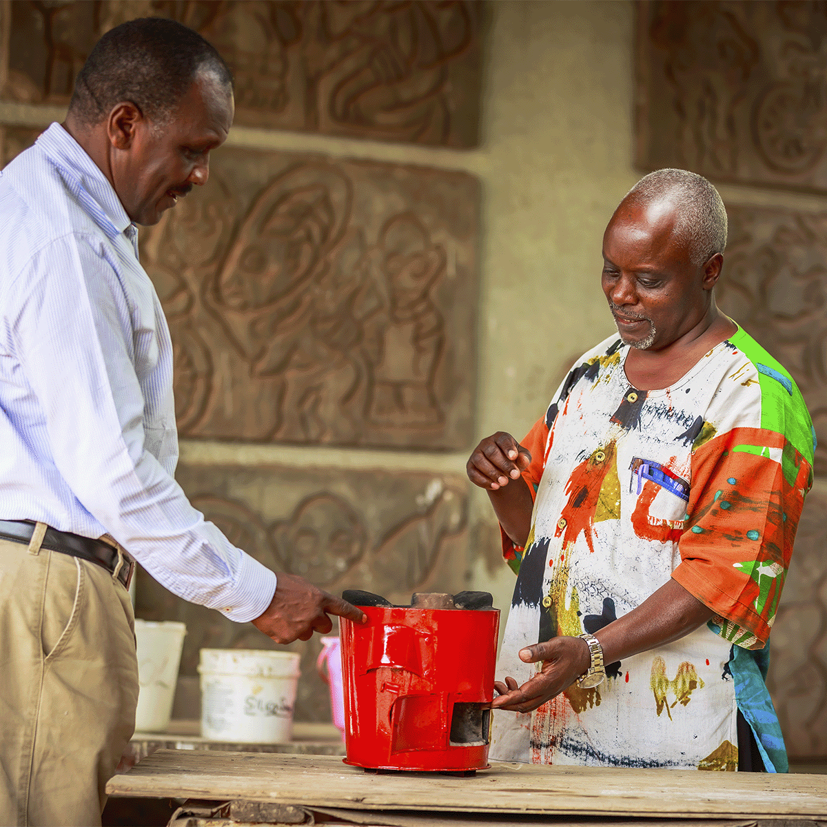 Hongera Energy Efficient Cookstoves Project_Haron Wachira checking a cookstove