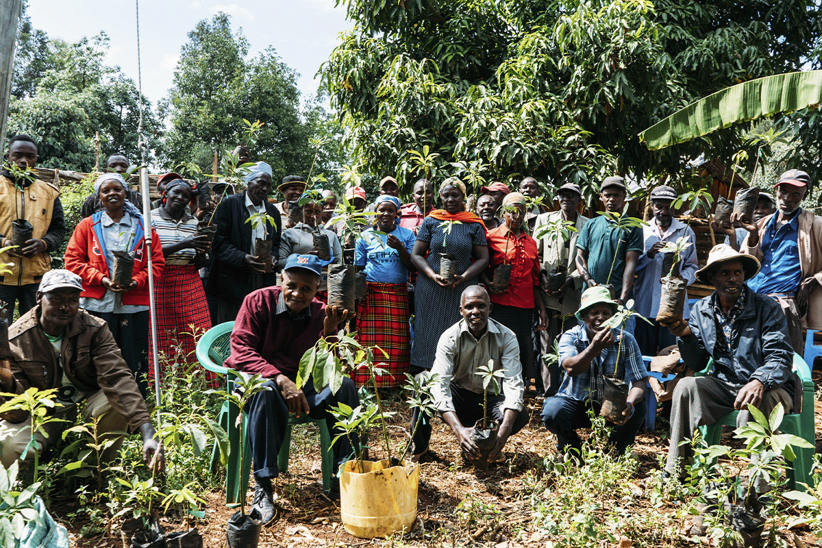 Hongera Reforestation Project expands its nurseries in Kenya_locals with tree seedlings before planting_visual 2