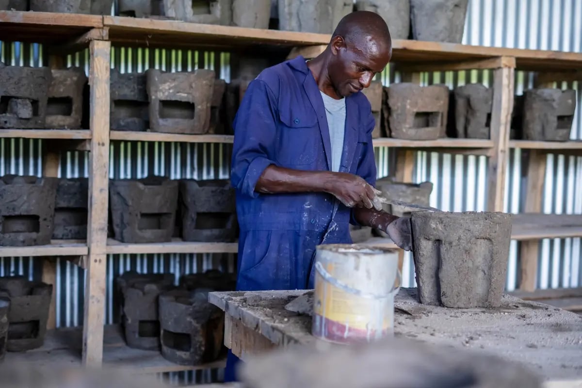 New stoves, new beginnings_ clean cooking for Maasai communities_A local artisan working in a cookstove factory_visual 2