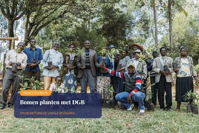 The rich tapestry of trees in DGB’s reforestation projects_Group of local people and DGB team members with tree seedlings_visual 1_NL