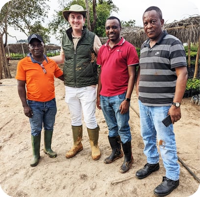 four smiling people