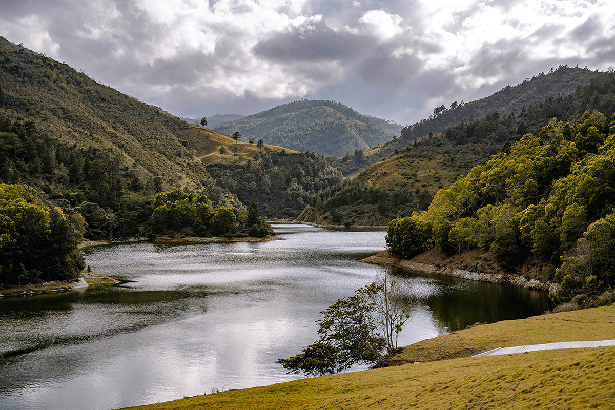 Water dam between mountains of Constanza, Dominican Republic.
